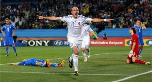 Robert Vittek of Slovakia celebrates score and vivtory over Italy